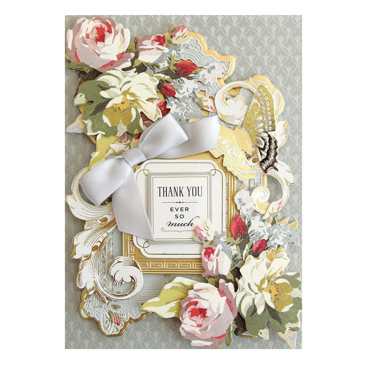 a card with flowers and a bow on it.