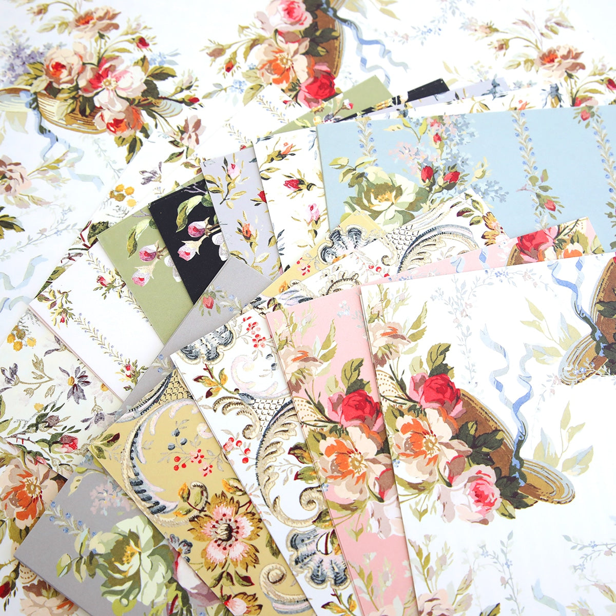 a bunch of papers that are laying on a table.