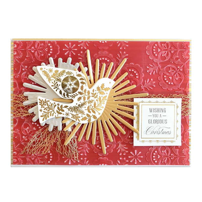 a red and gold card with a bird on it.