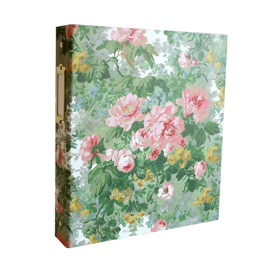 a suitcase with a floral pattern on it.