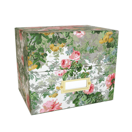 a floral box with a name tag on it.