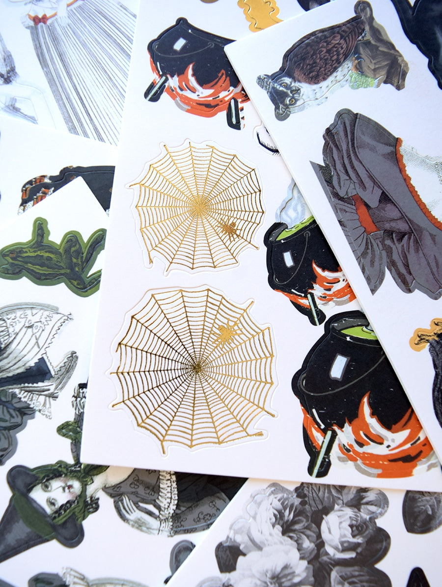 a pile of cards with different designs on them.