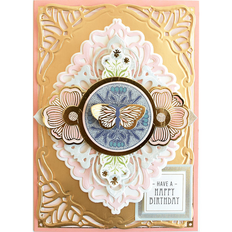 a handmade birthday card with a butterfly on it.