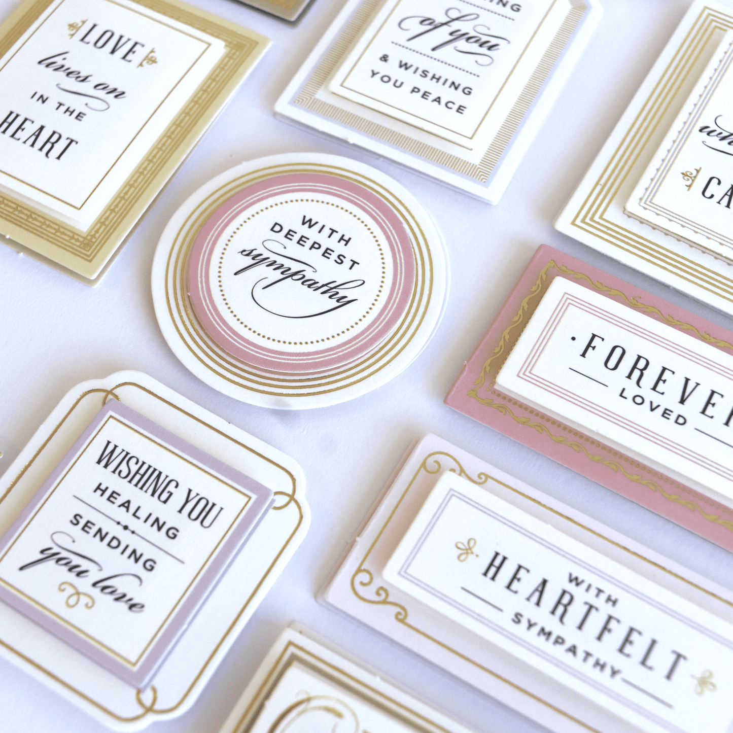 a table topped with lots of different types of business cards.