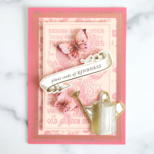 Pink framed, floral card with butterflies, watering can and sentiment.