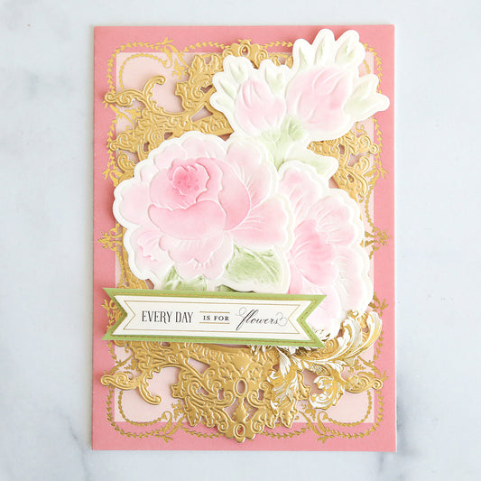 pink card with gold frame die, inked roses and green sentiment