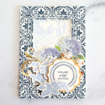 Navy blue stamped frame card with blue floral collage