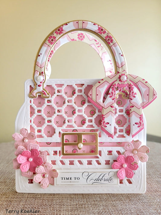 Pink and white patterned purse card with flowers and a bow.