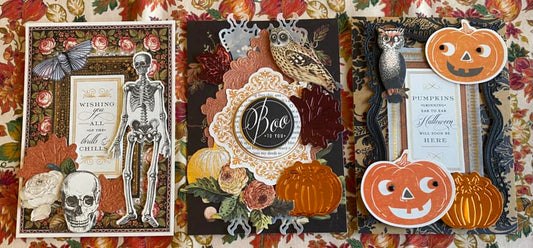 A trio of halloween cards on a leaf background