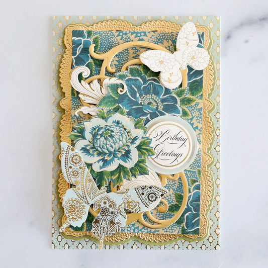 Blue floral card with gold dies and butterflies