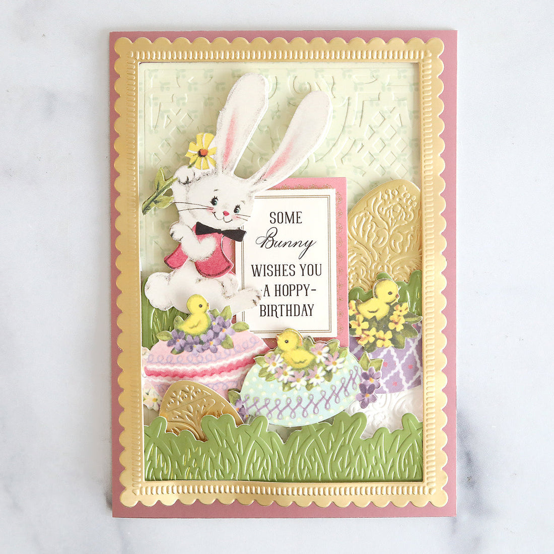 3D scene card with bunnies, eggs, easter grass and a gold frame