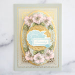 Light blue and gold layered card with pink flowers and stamped sentiment