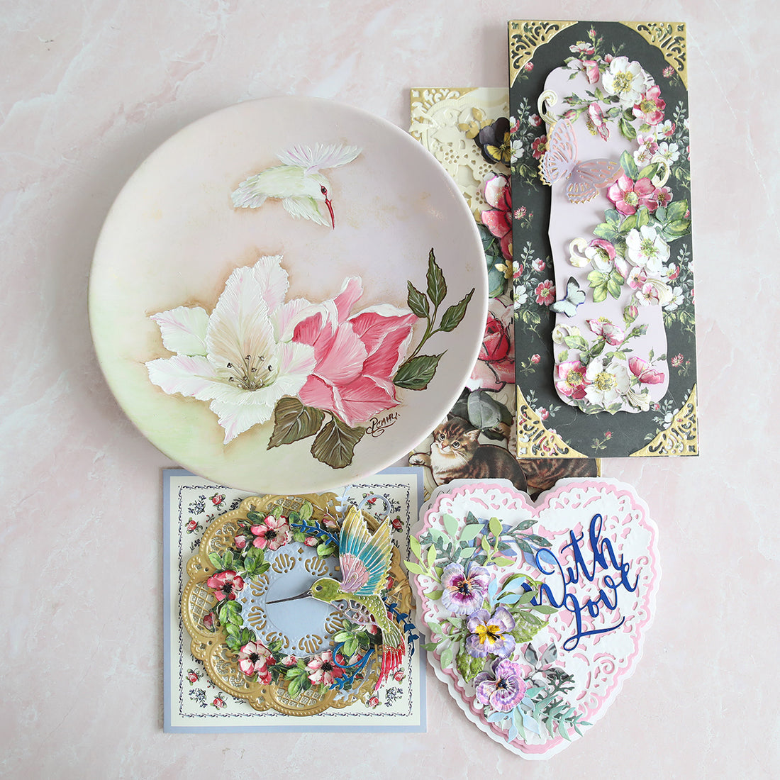 A series of sculpted flower projects and a painted plate