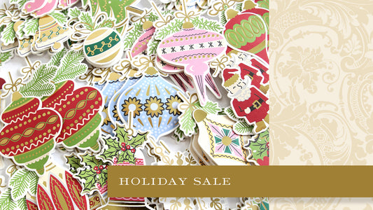 multi-colored holiday baubles and words Holiday Sale