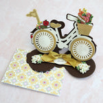 a brown and gold bicycle easel card to be repurposed