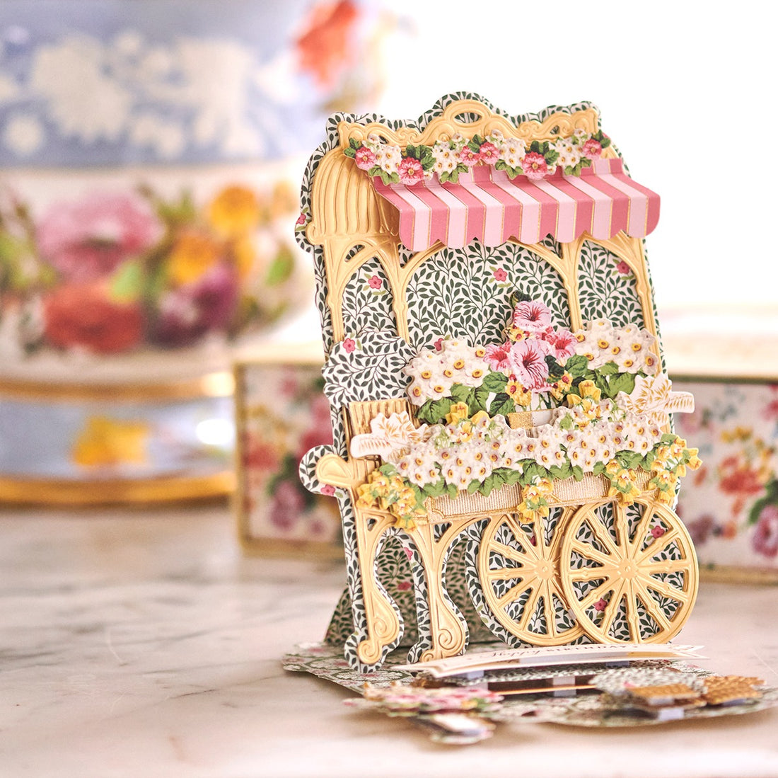 a close up of a toy horse drawn carriage.