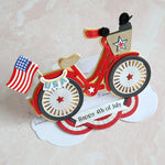 patriotic bicyle easel card with US flag and banner.