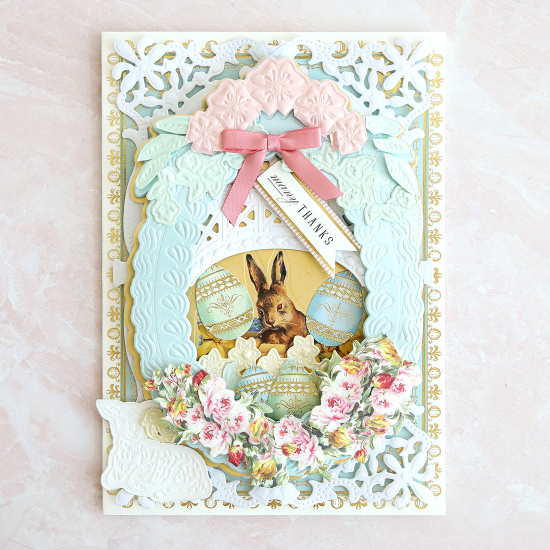 a card with a picture of a bunny and eggs.