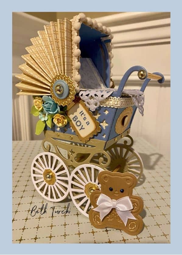a baby carriage with a teddy bear in it.
