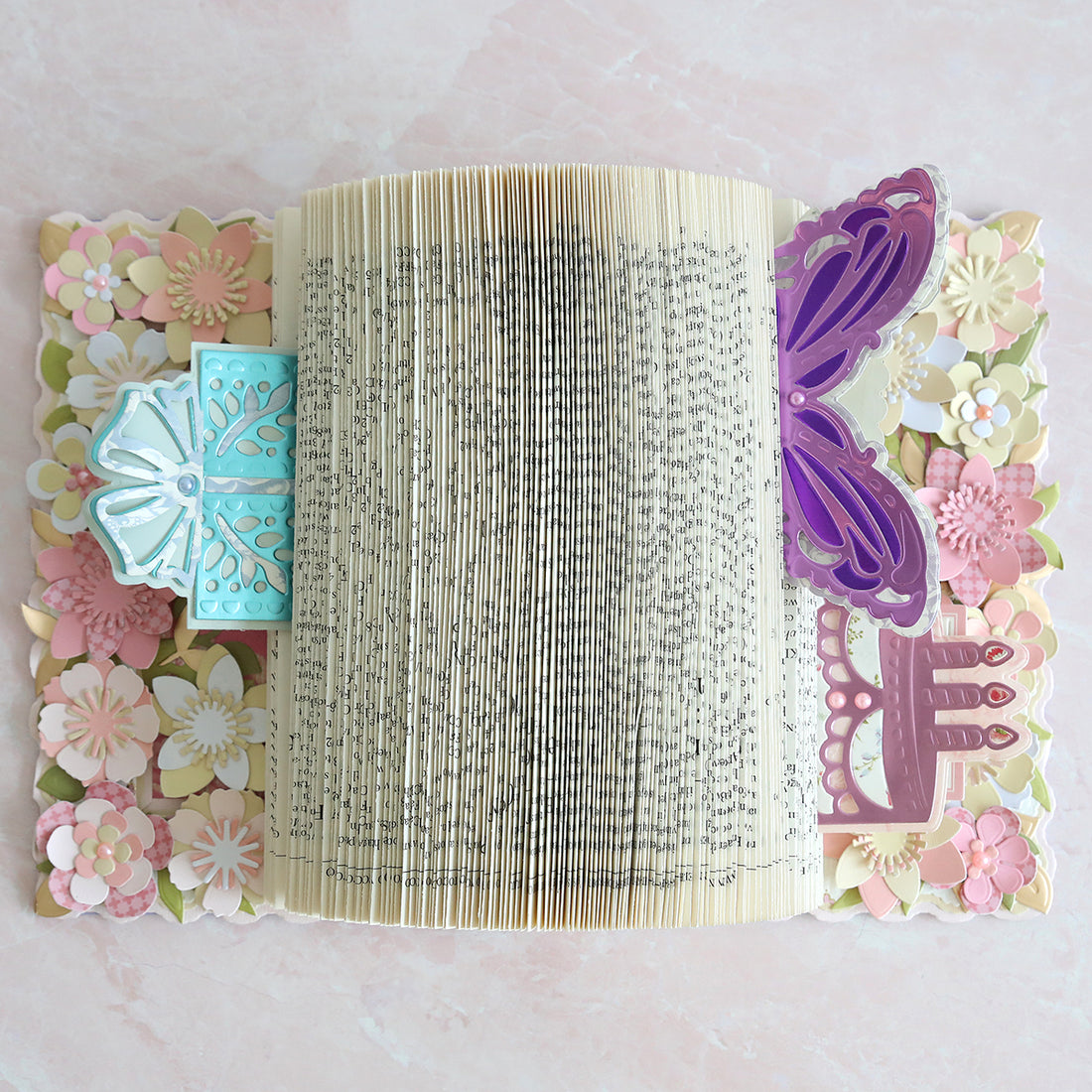 Folded page book to hold birthday cards and gift card holders.