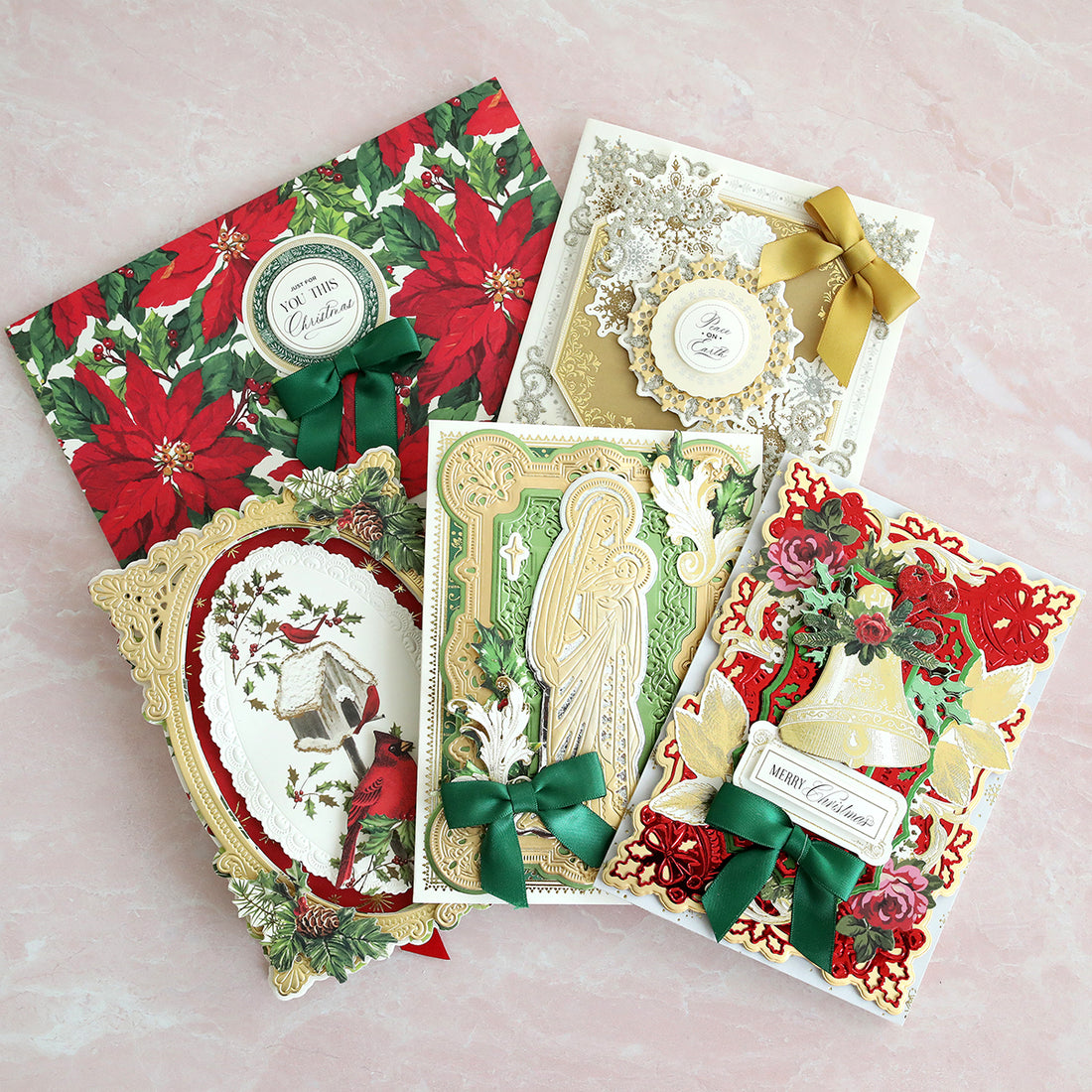 a collage of red, green and gold Christmas cards