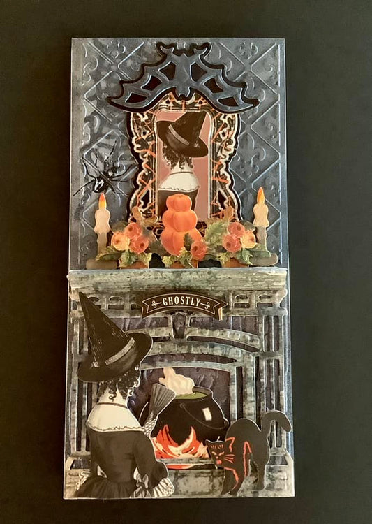 A card with an image of a witch and a fireplace.