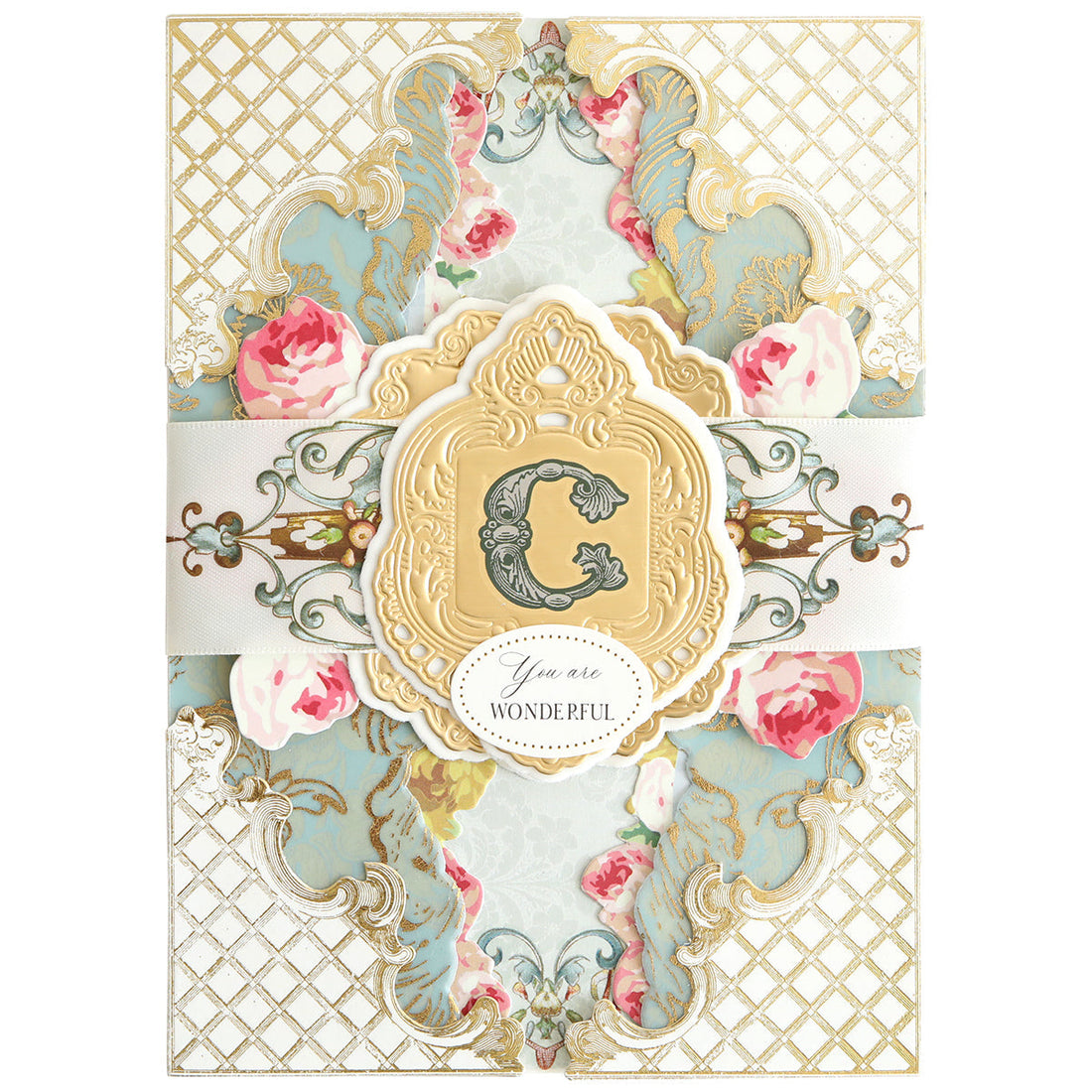 White, blue and pink card with a "c" monogram.