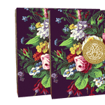 A set of two books with flowers on them.