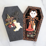 Black coffin card with black and orange vampire