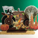 Harvest tractor with pumpkins, wheat and chicken