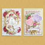 two cards surrounded by embellishments