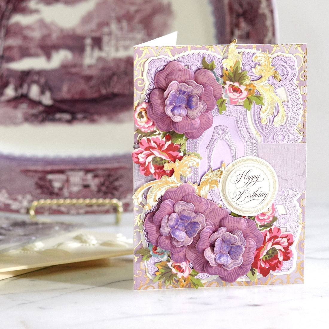 Layered purple card with 3D flowers and happy birthday sentiment