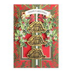 Red and green patterned card with stamped instruments