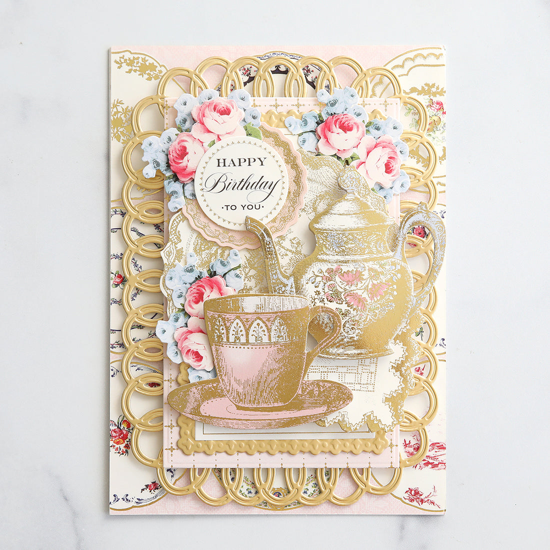 Teapot and teacup card with pink and blue flowers