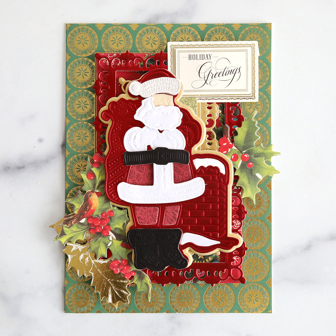 Green layered card with pieced Santa and holly