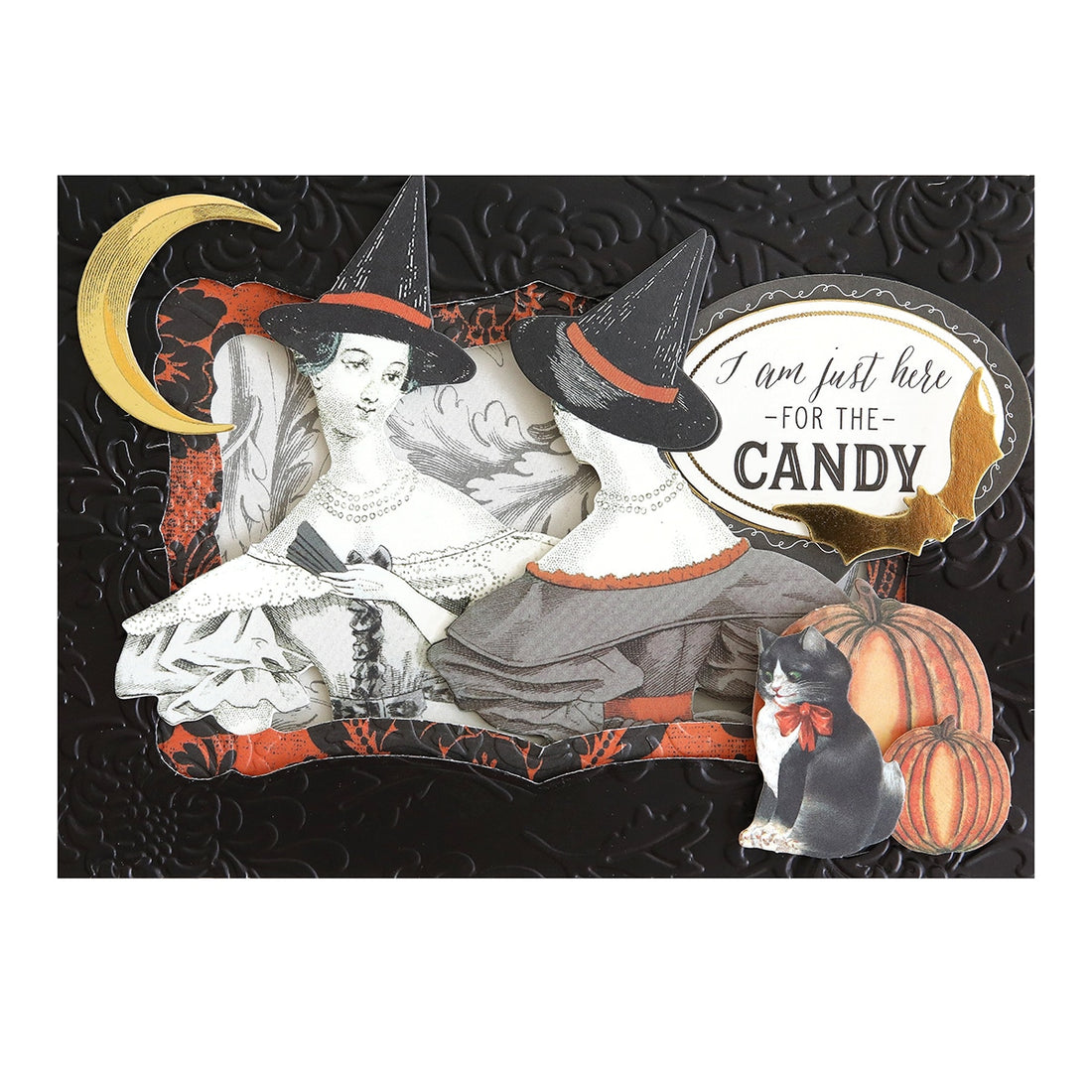 A halloween card with two witches and a pumpkin.