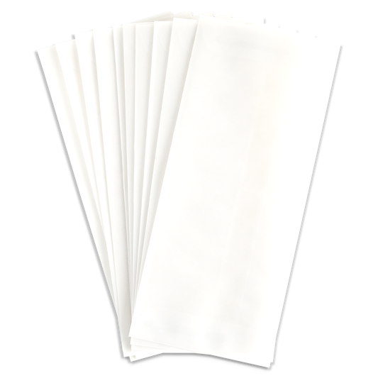 A stack of white rectangular sheets is fanned out against a light grey background, shown alongside the 10 Pack Vellum Envelopes (9.5″ x 4.125″)—an ideal pairing for creating elegant invitations.