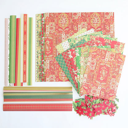 Papers, strips, and poinsettia cutouts from the Jasmine Holiday Papercrafting Kit are arranged neatly on a white surface, showcasing festive Christmas-themed embellishments and patterned cardstock perfect for all your seasonal crafting projects.