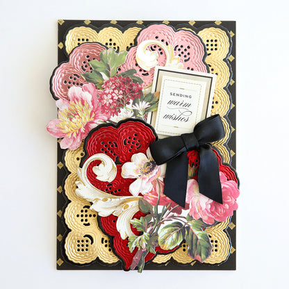 A vintage-inspired Valentine's card adorned with 3D Lace Doily Dies and embellished with a bow and flowers.