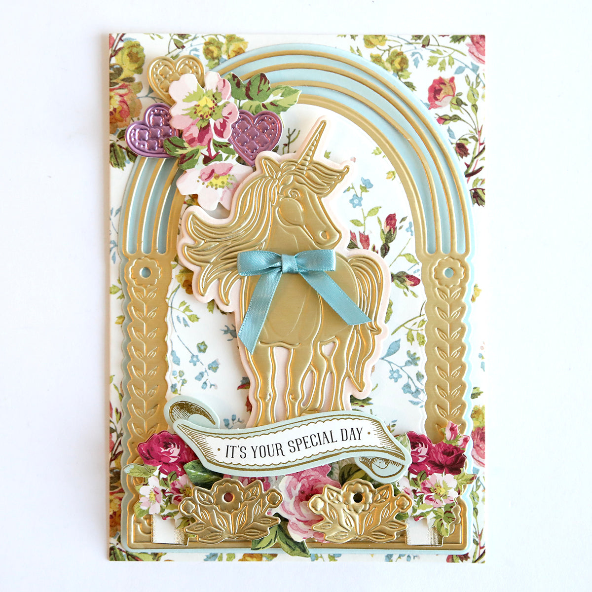 A decorative greeting card crafted with the 3D Unicorn Scene Dies, featuring floral patterns and a message saying "it's your special day.