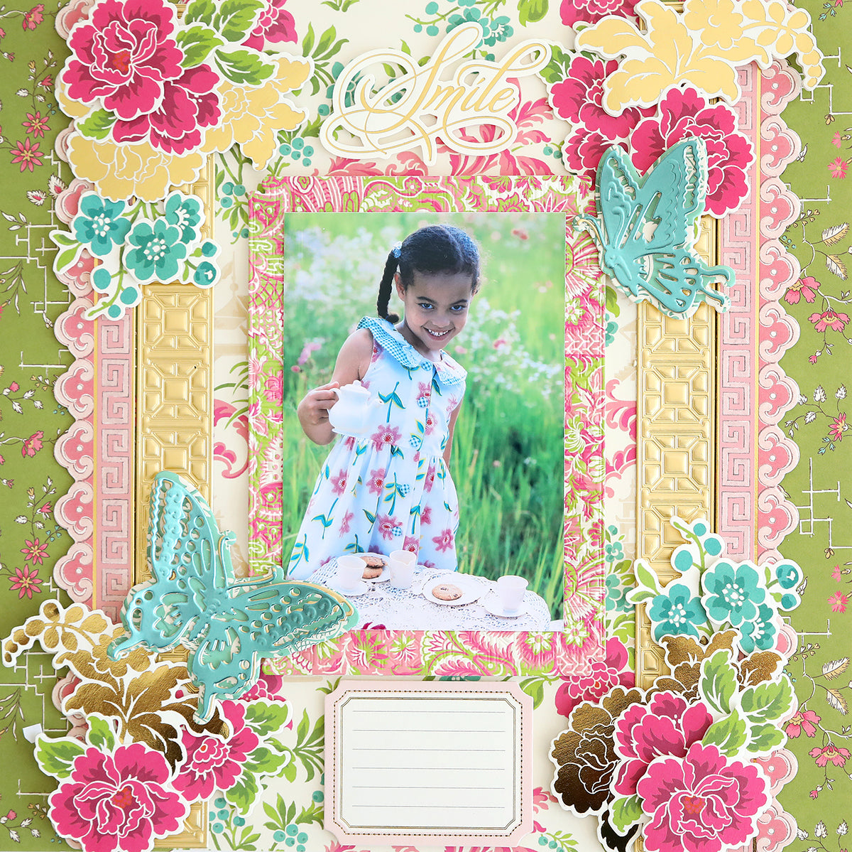 A young girl in a floral dress pours tea outdoors, framed by a vibrant butterfly and flower scrapbook layout—perfect inspiration for your next card or page using the Chinoiserie Papercrafting Kit with Dies.