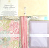 A cardmaking kit with floral patterned papers, pink and purple cards, labeled "Ultimate Vintage Botanical Papercrafting Collection.
