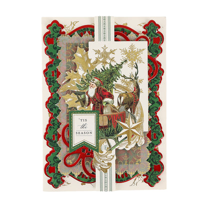 Celebrate the season with the Christmas Engravings Cards and Envelopes—beautifully detailed holiday cards featuring layered cutouts of Santa Claus in his sleigh, reindeer, a Christmas tree, and “‘Tis the Season” on the front. Perfect for Anna Griffin fans or anyone passionate about creating memorable Christmas cards.