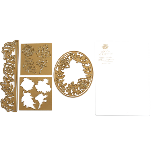 The "Wildflower 3D Folder and Dies," featuring gold metal craft dies with floral designs and an embossing folder, are attractively presented next to white "Anna Griffin" packaging. These detailed cutting dies infuse wildflower garden elegance into your creative projects.