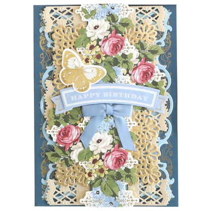 The Floral 12" Border Stickers showcase beautiful floral patterns, a charming blue ribbon bow, a delightful butterfly illustration, and a "Happy Birthday" banner at the center. Ideal for adding a touch of elegance to scrapbook pages or handmade cards, they bring sophistication to your special moments.