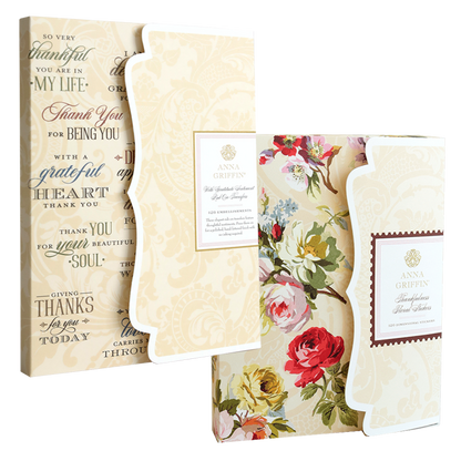 Thankful Sentiments and Floral Stickers: two packages, one with black sentiment rub-ons on cream and one with floral stickers featuring red and yellow roses.