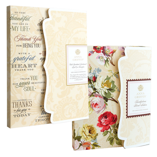 Thankful Sentiments and Floral Stickers: two packages, one with black sentiment rub-ons on cream and one with floral stickers featuring red and yellow roses.