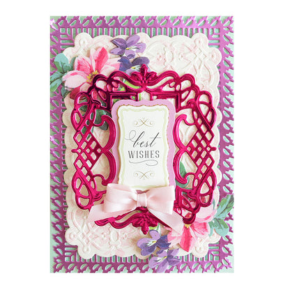 Decorative card from the Black Friday Empress Mini Bundle featuring a "Best Wishes" message. Showcases intricate pink and white patterns, flowers, and a pink bow on a purple and white background, crafted using an embossing machine for elegant detail.