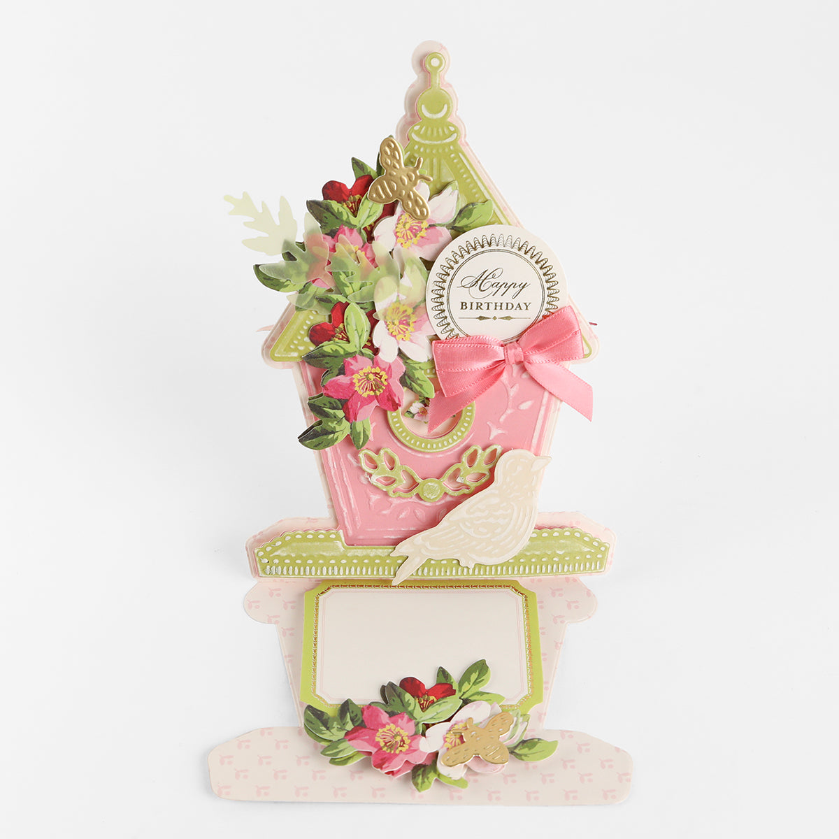 Using the Birdhouse Easel Card Dies, this decorative pink birdhouse card is beautifully crafted and embellished with delicate flowers, a pink bow, and a white bird. The charming card features a cheerful “Happy Birthday” message on the front and includes a blank interior for your personal note—ideal for celebrating birthdays or sending warm housewarming wishes.