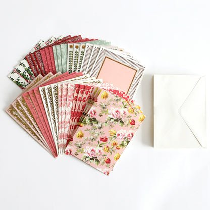 A selection from the Lace Doily Embellishments, Cards and Envelopes collection featuring floral and patterned envelopes enhanced with intricate embellishments, paired with a plain white envelope, beautifully displayed on a white background.